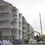 В Керчи на домах для переселенцев «с моста» появилась противоречивая надпись